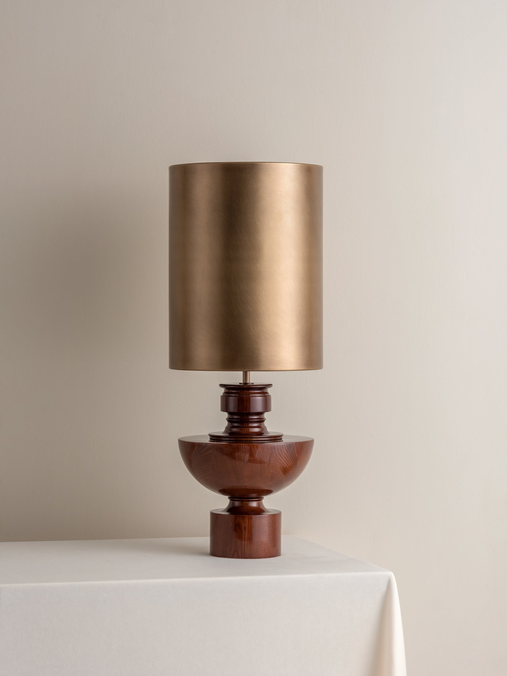 Editions spun wood lamp with aged brass shade