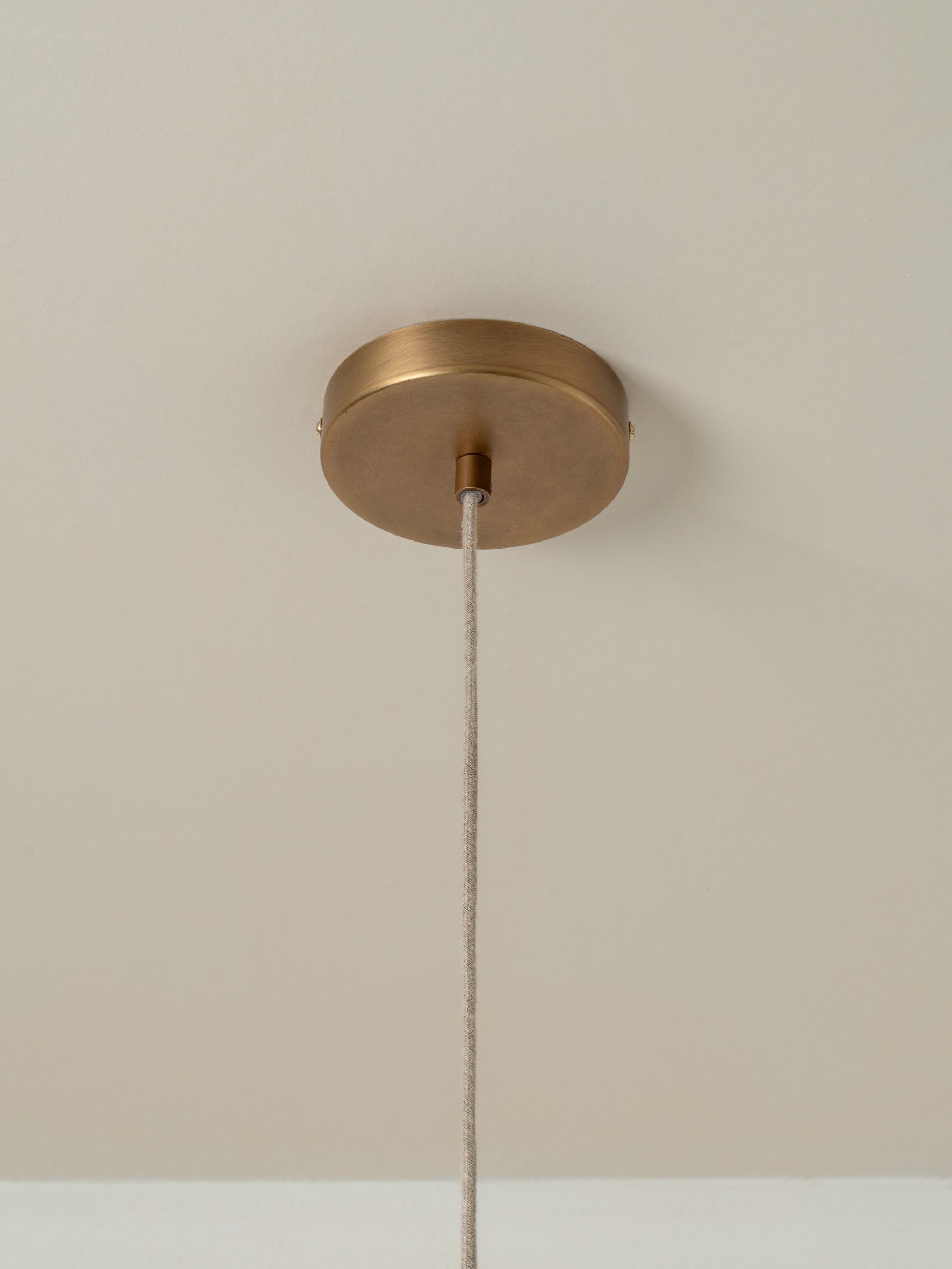 lights&lamps Ostrea pendant light with a pleated linen design on a plain background