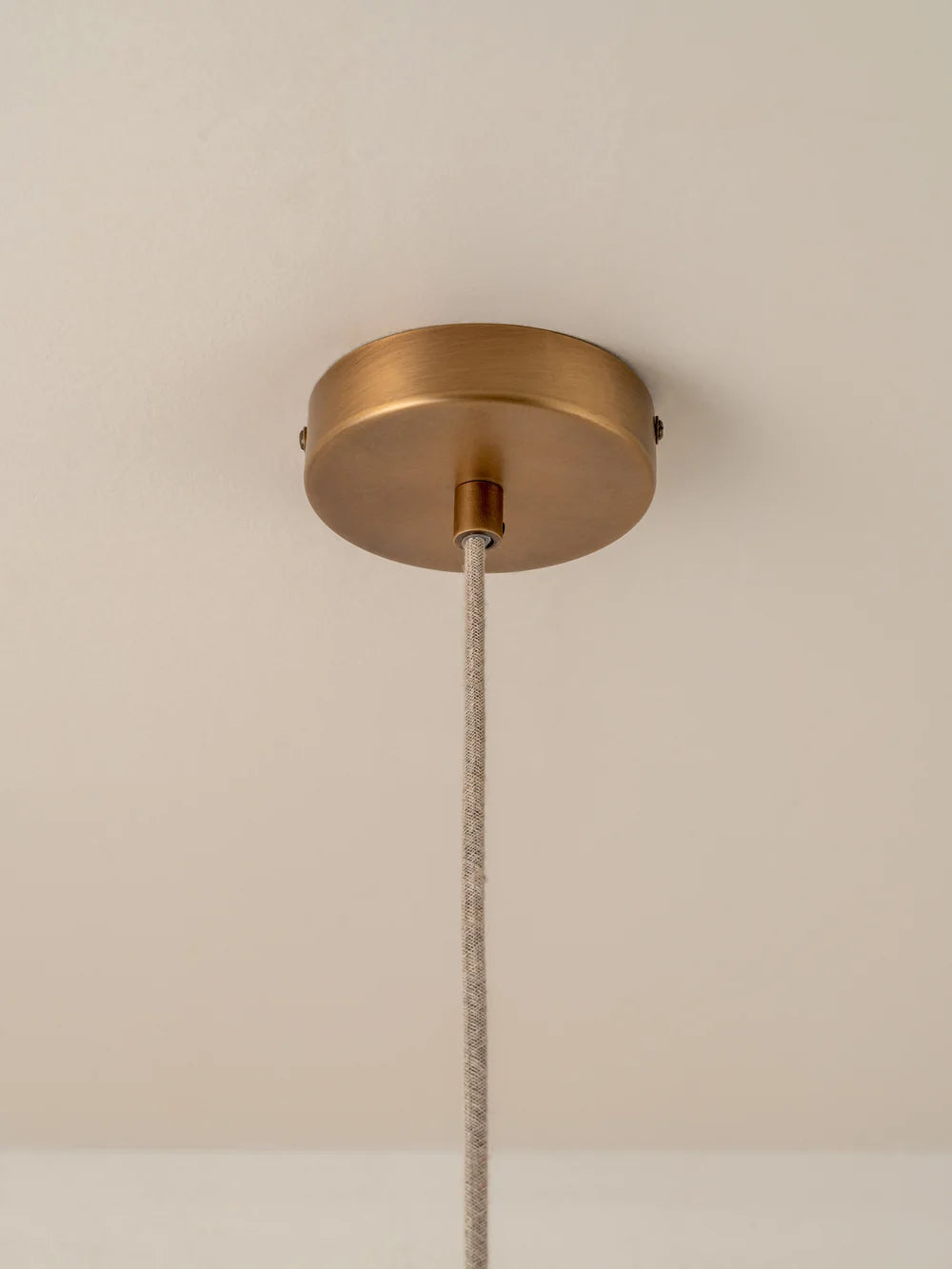 Porsa aged brass and warm white porcelain pendant