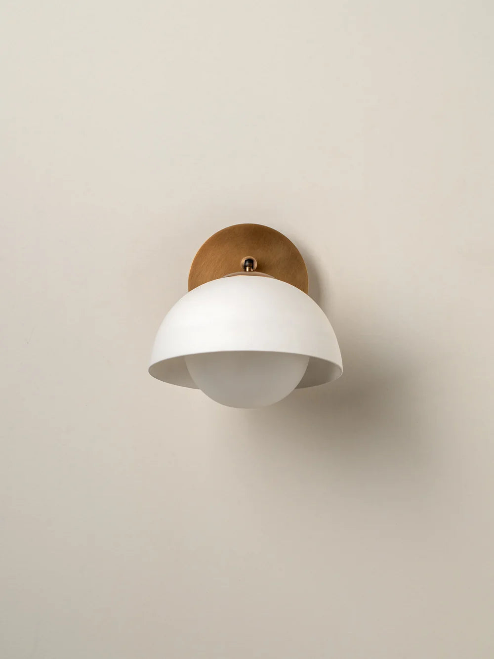 Porsa aged brass and warm white porcelain wall light
