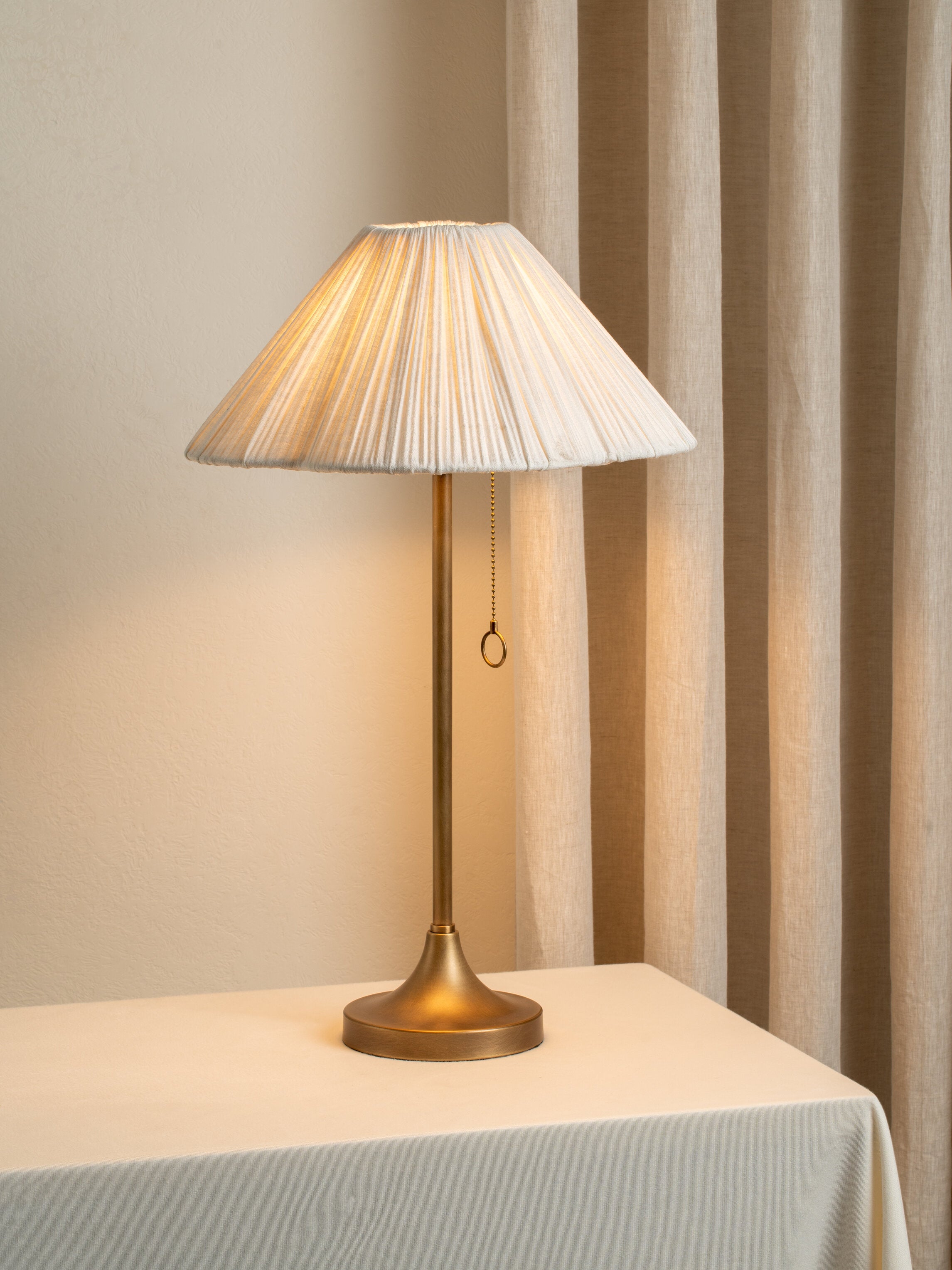 Lindi - aged brass and scalloped linen table lamp | Table lamp | lights & lamps | UK | Modern affordable designer