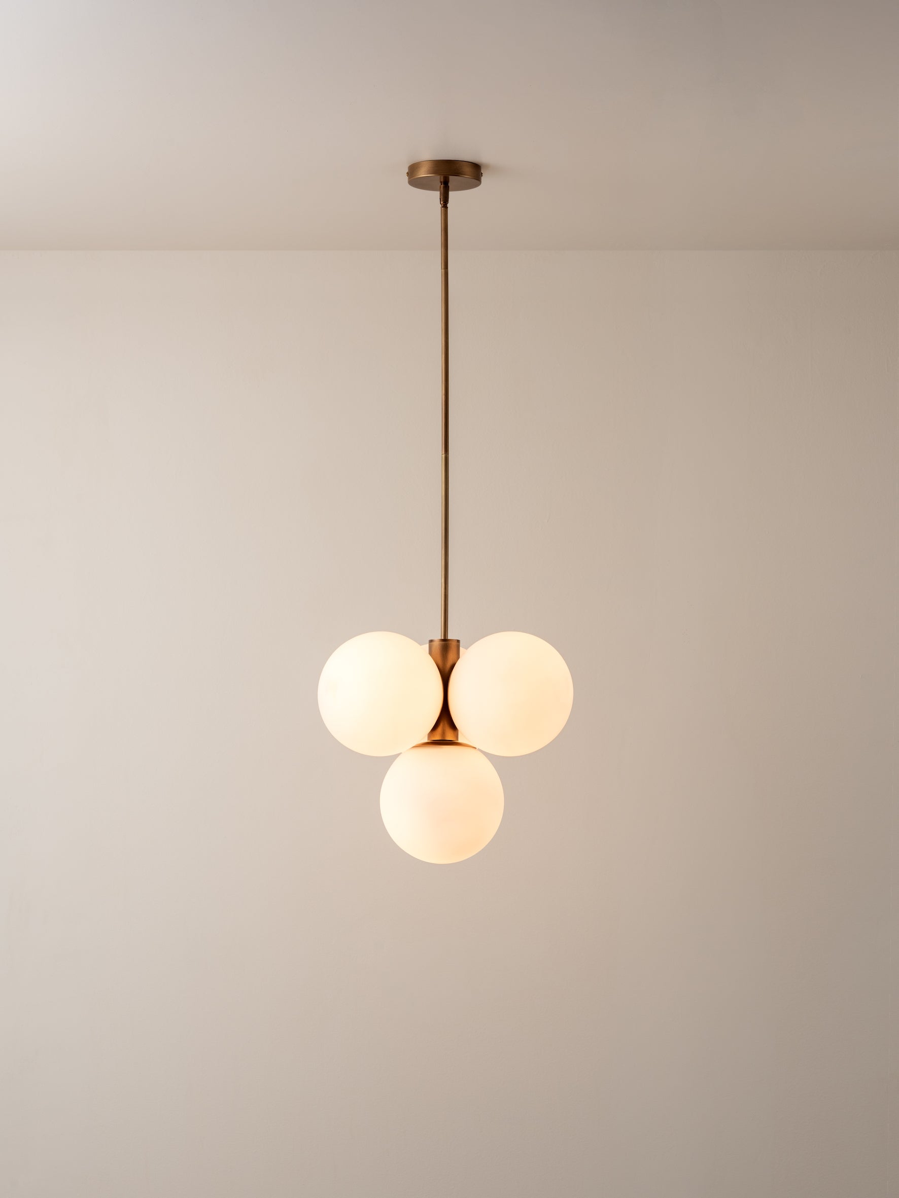 Boule - 4 light brass and opal pendant light | Ceiling Light | Lights & Lamps Inc | Modern Affordable Designer Lighting | USA