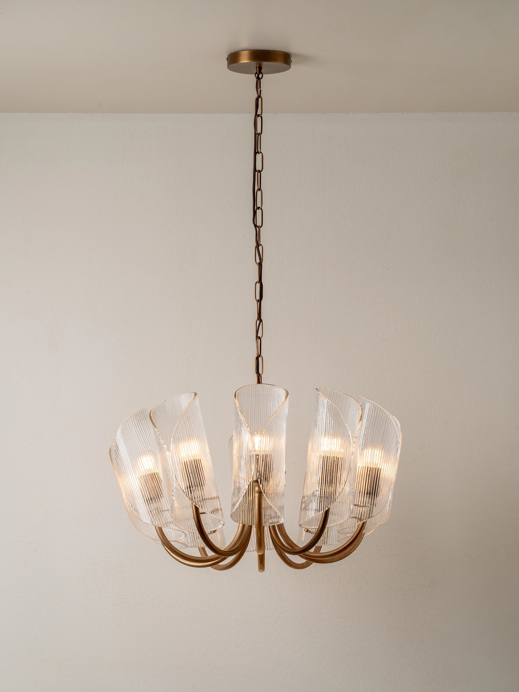 Cannoli - 10 light aged brass and textured glass chandelier | Chandelier | lights & lamps | US | Modern affordable designer lighting