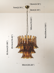 A hanging amber glass chandelier with overlaid dimension labels showing width, height, and canopy measurements on a plain light background.