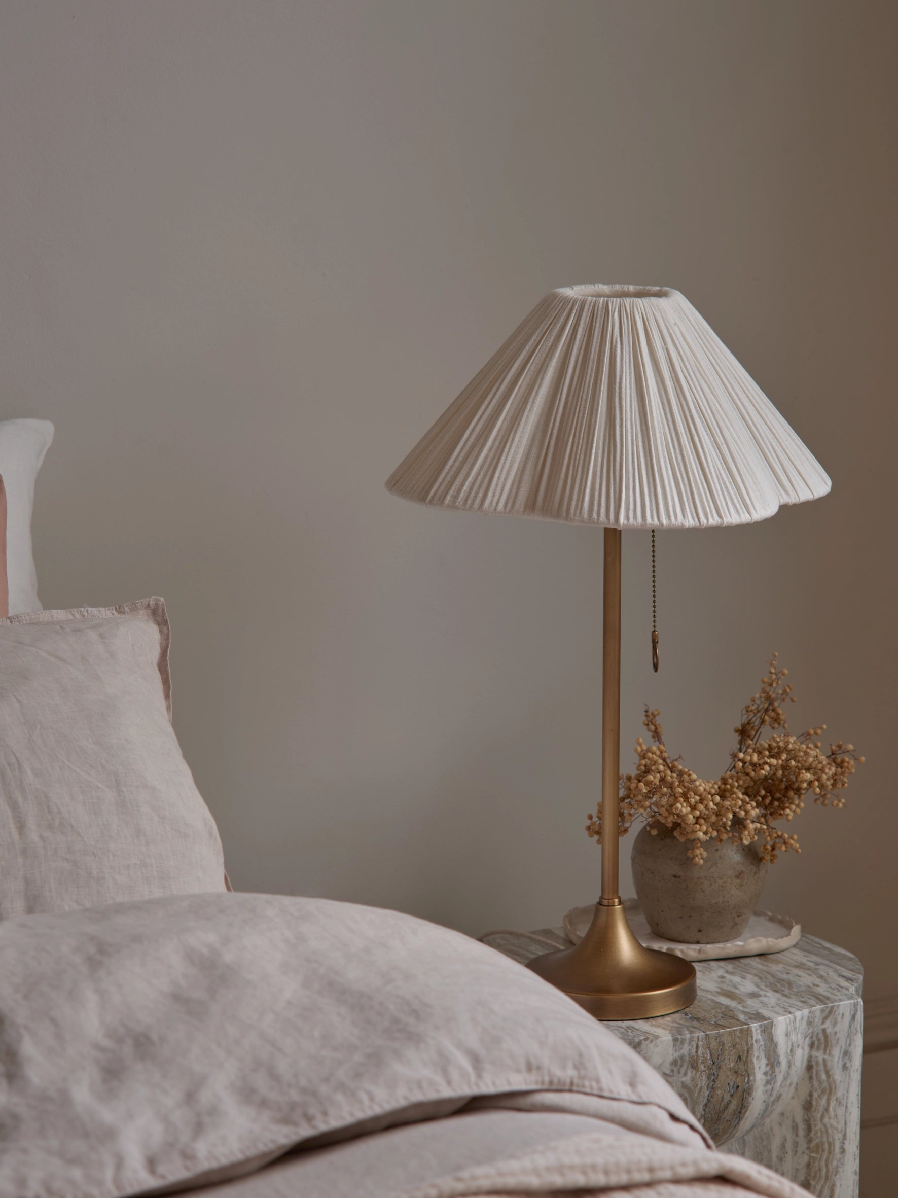 lights_lamps_Lindi_small_aged_brass_and_scalloped_linen_table_lamp_LL4009_lifestyle_1.webp