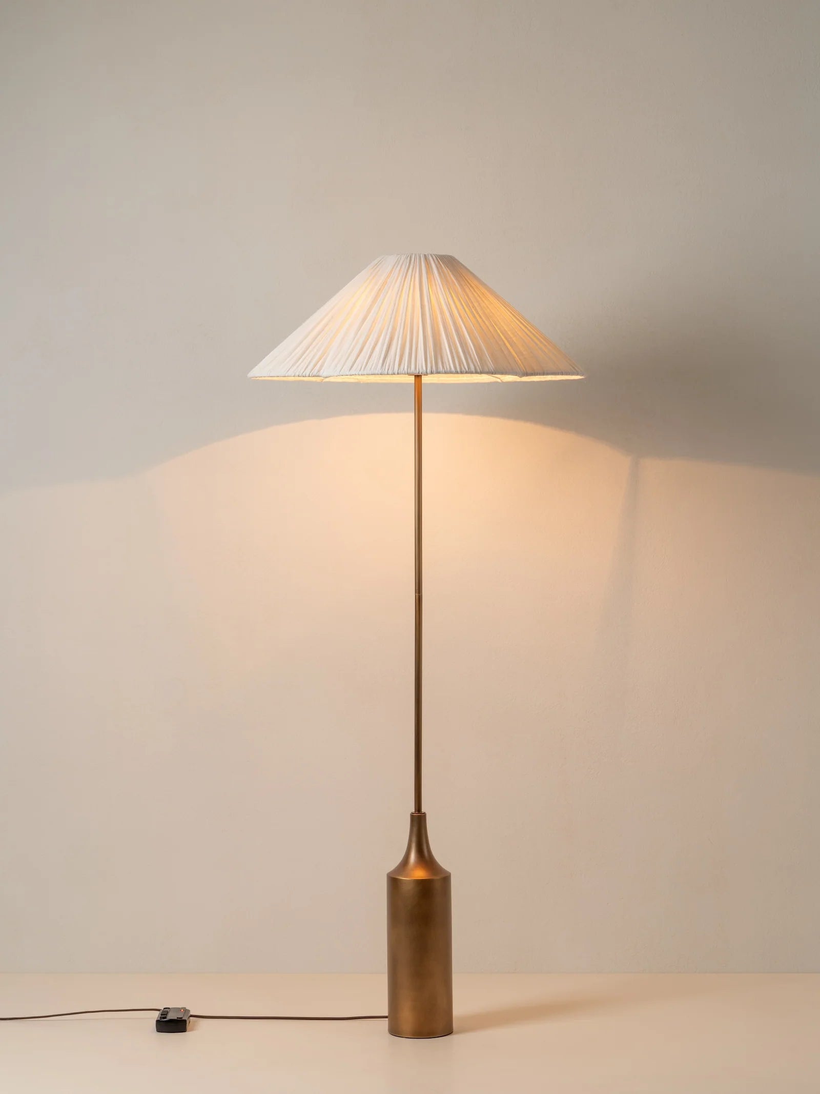 Lindi - aged brass and linen scalloped floor lamp