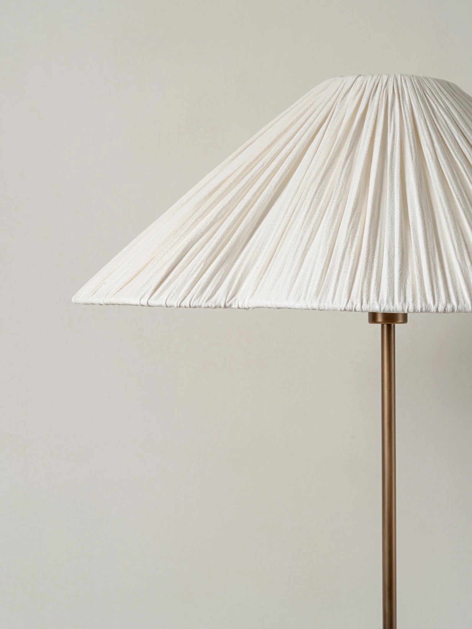 Lindi - aged brass and linen scalloped floor lamp