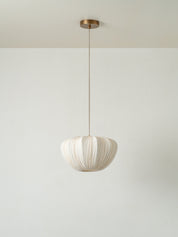 lights&lamps Ostrea pendant light with a pleated linen design on a plain background