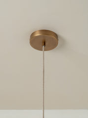 lights&lamps Ostrea pendant light with a pleated linen design on a plain background
