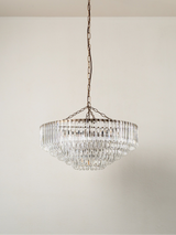 Petalia - 9 light aged brass and clear glass tube wide chandelier