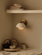 Porsa aged brass and warm white porcelain wall light