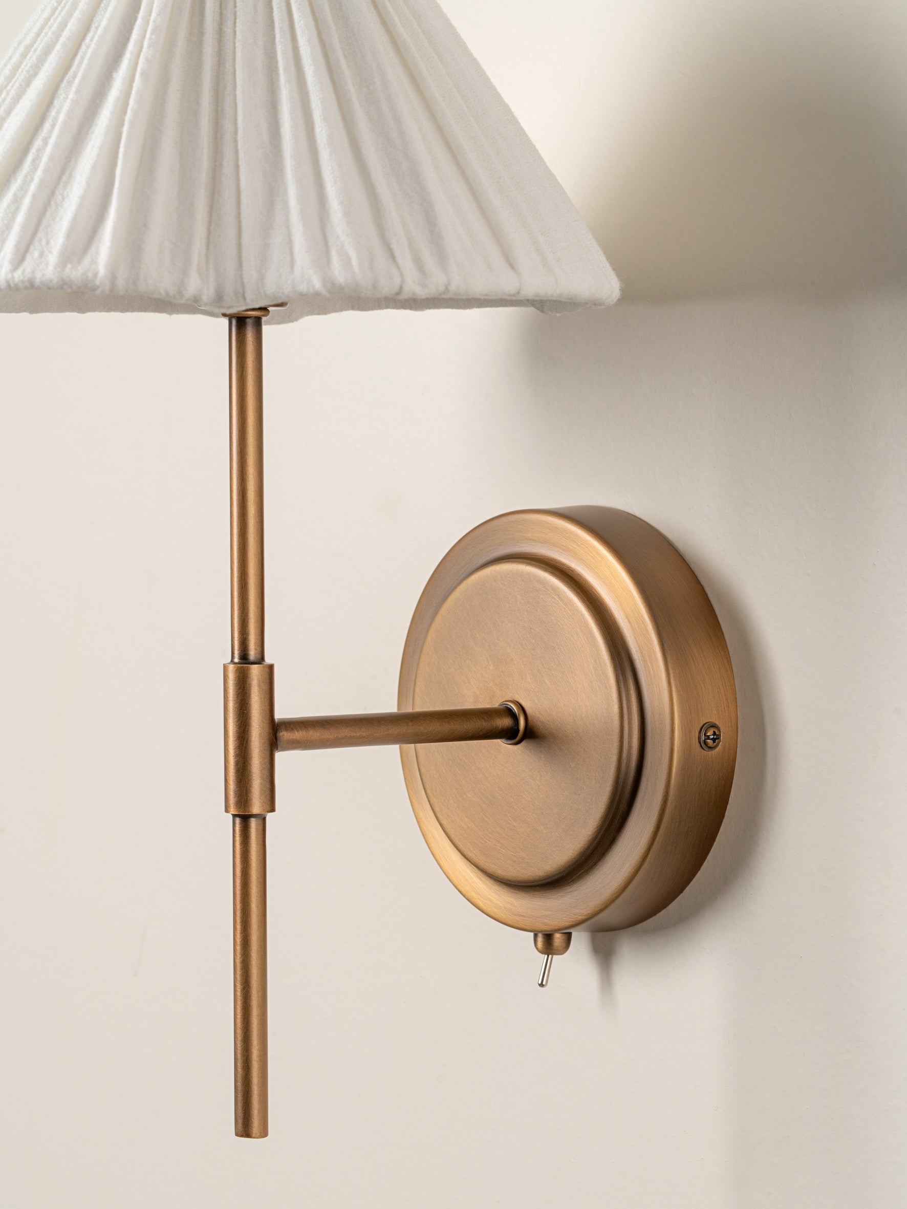 Lindi - aged brass and linen scalloped wall light | Wall Light | lights&lamps | UK | Modern Affordable Designer Lighting