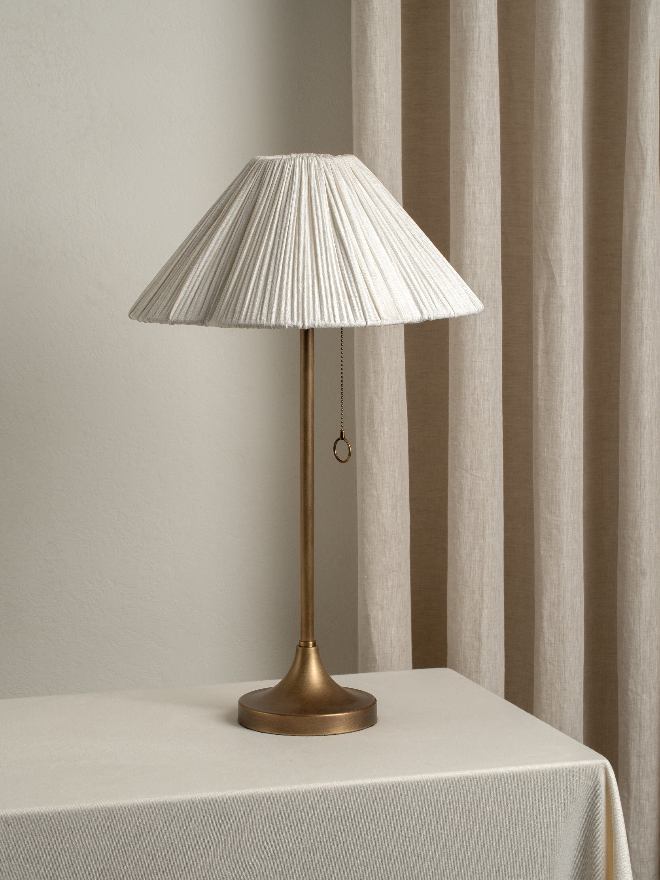 Lindi - aged brass and scalloped linen table lamp | Table lamp | lights & lamps | UK | Modern affordable designer 