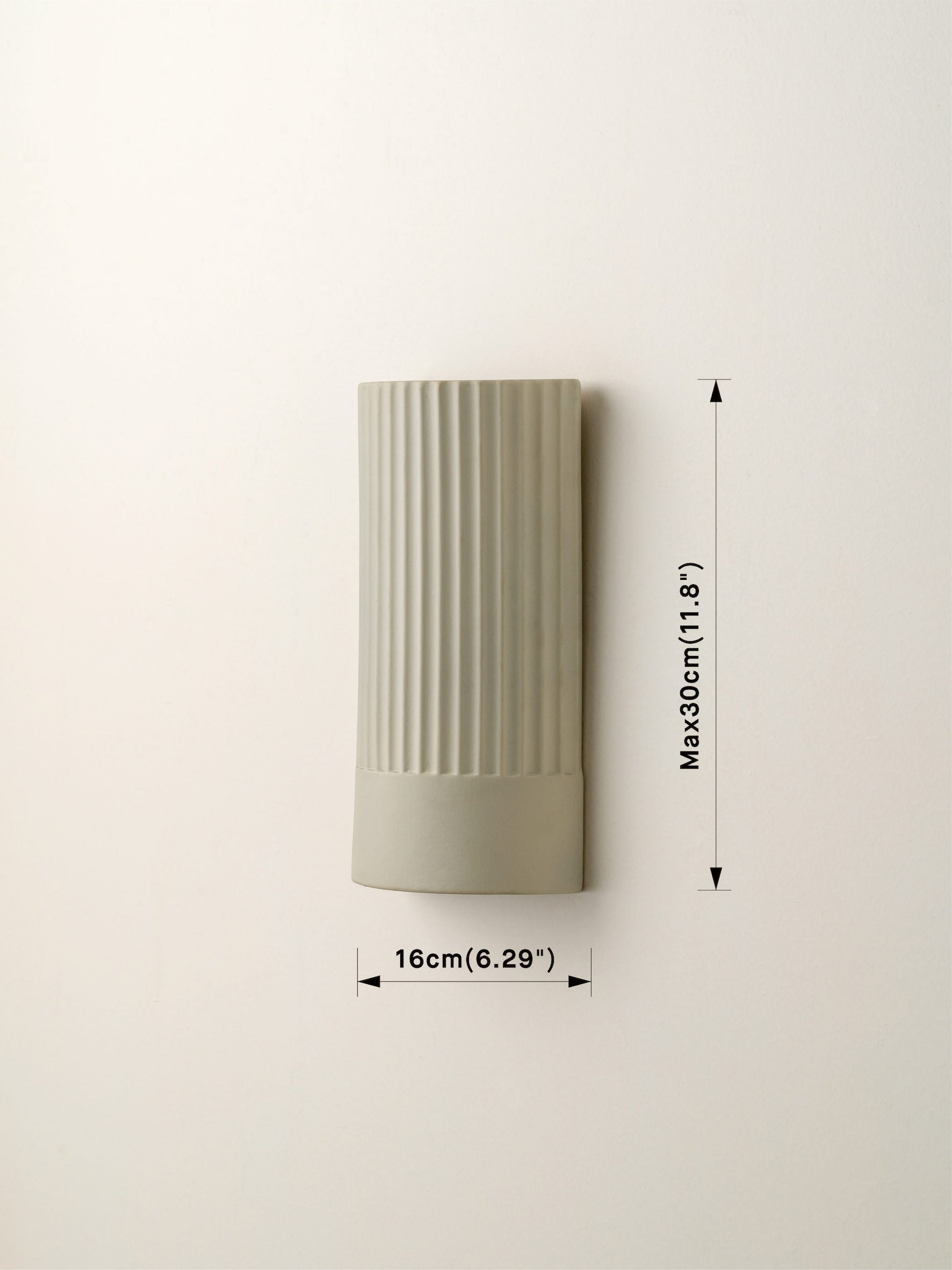 Enza - warm white  ribbed concrete wall light