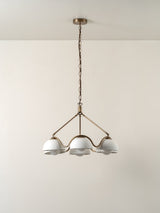 Waverly - 6 light aged brass and white porcelain pendant