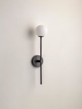 Chelvara - matt black and opal wall light
